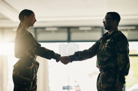 Photo for Meeting, army or soldiers shaking hands for partnership, teamwork or deal in war agreement together. People, promotion or handshake for team fight, thank you or gratitude in solidarity or military. - Royalty Free Image