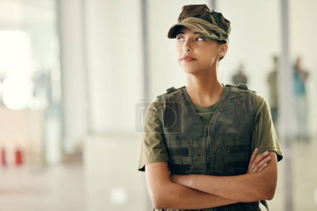Photo for Military, idea and arms crossed with a woman soldier in uniform for safety, service or patriotism Army, thinking and a serious young war hero looking confident or ready for battle in camouflage. - Royalty Free Image