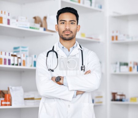 Photo for Pharmacist, man and arms crossed for healthcare service, medicine inventory and store management. Professional portrait of medical worker or asian doctor in pharmacy or clinic, pills or product shelf. - Royalty Free Image