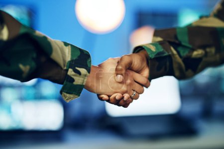 Photo for Military, army or shaking hands for partnership, teamwork or deal in war, agreement or unity together. People, soldiers or handshake for team fight, thank you or gratitude in solidarity for a mission. - Royalty Free Image