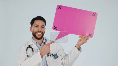 Photo for Man, doctor and speech bubble mockup, presentation or healthcare chat, FAQ and health advice in studio. Face, quote and medical worker pointing to poster ideas and tracking marker on white background. - Royalty Free Image