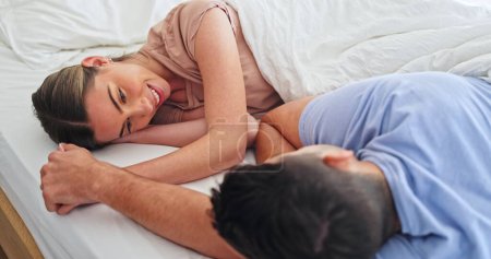 Photo for Love, hand holding and relax with couple in bedroom for happy, intimate and marriage. Connection, partner and morning with man and woman in bed at home for peace, care and relationship together. - Royalty Free Image