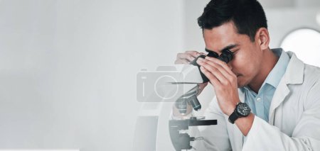 Photo for Microscope, science and banner of man in laboratory for research, analysis and studying genes, particles or dna. Scientist, biotechnology and check lens to review investigation, test and mockup space. - Royalty Free Image