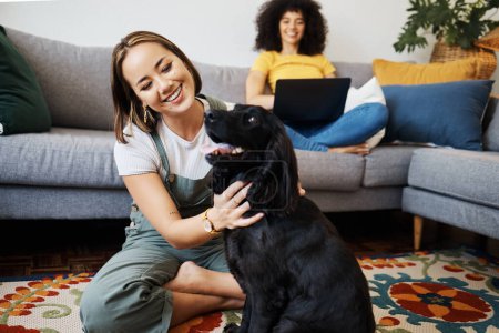 Photo for Pet, relax or happy woman with dog in house living room on floor to hug with trust, loyalty or love. Wellness, freedom or girl playing with an animal with care, support or kindness on mat at home. - Royalty Free Image