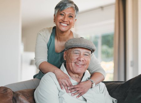 Photo for Senior couple, portrait and smile in home for retirement, marriage commitment and loyalty to partner. Happy man, woman and hug of support, trust and freedom to relax, love and together in living room. - Royalty Free Image