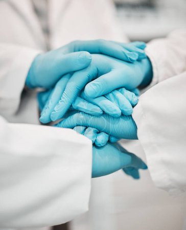Photo for Ppe, Nurses and hands together for support, teamwork and solidarity in hospital with gloves. Doctors, working people and professional in collaboration for healthcare, motivation and community. - Royalty Free Image