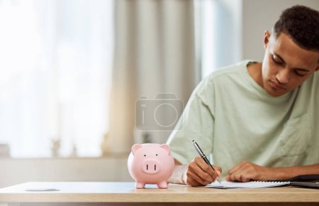 Photo for Piggy bank, finance and man with budget, writing and savings with bills, planning and future at home. Money management, growth and investment, financial strategy with notes and wealth in account. - Royalty Free Image