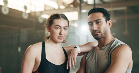 Photo for Fitness, friends and face in gym with confidence, workout and exercise class. Diversity, young people and wellness portrait of serious athlete with coach ready for training and sport at a health club. - Royalty Free Image