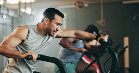 Photo for People, diversity and cycling at gym in workout, exercise or intense cardio fitness together and motivation. Diverse group burning sweat on bicycle machine for healthy body, wellness or lose weight. - Royalty Free Image