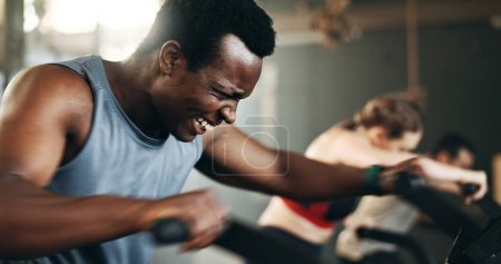 Photo for People, diversity and cycling on bicycle at gym in workout, exercise or intense cardio fitness together and motivation. Diverse group burning sweat on machine in healthy body, wellness or lose weight. - Royalty Free Image