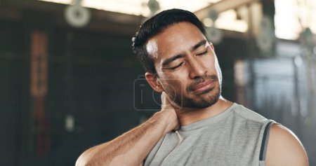 Photo for Fitness, neck pain and face of man at gym for training with muscle, problem or arthritis. Sports, injury and guy athlete with shoulder, joint or massage for backache, fibromyalgia or osteoporosis. - Royalty Free Image