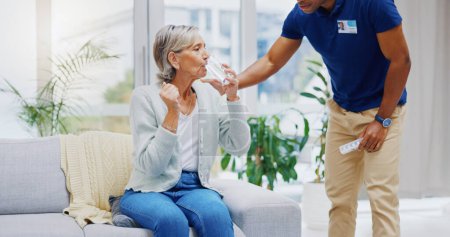 Photo for Sick, caregiver or old woman in home to take pills or supplements for healthcare vitamins or wellness. Drinking water, medication tablets or male nurse nursing or helping senior person with drugs. - Royalty Free Image