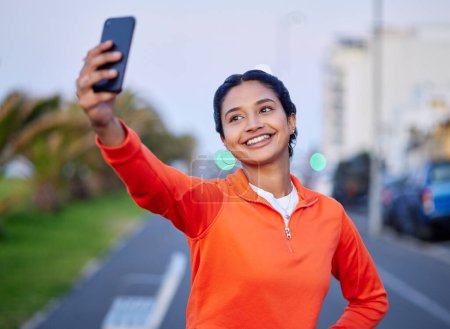 Photo for Selfie, woman and smile in street for profile picture, internet post and social media outdoor in nature with technology. City, girl and happiness in urban town for relax, freedom and cheerful online. - Royalty Free Image