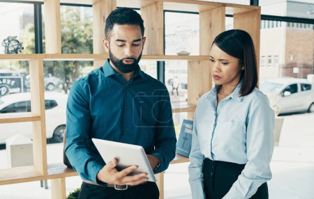 Photo for Business, woman and man with tablet for communication, meeting and project management in office. Professional, people and employees with touchscreen for planning, discussion or recruitment at work. - Royalty Free Image