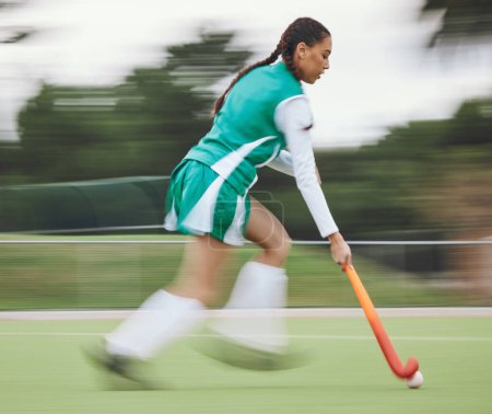 Photo for Hockey, speed or woman running in game, tournament or training with ball, stick or action on turf. Blur, sports or fast girl player in exercise, workout or motion on artificial grass for fitness. - Royalty Free Image