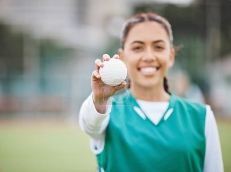 Photo for Female, person and smile for hockey with ball in hand on field for competition, match or workout. Girl, happy and confident with sports, equipment or gear for game, training and health for wellness. - Royalty Free Image