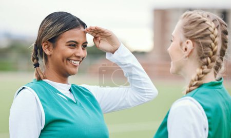 Photo for Woman, friends and hockey salute for fun on sports field for game in competition, training or fitness. Female athlete, play and exercise for outdoor contest in sun for strong workout, cardio or smile. - Royalty Free Image