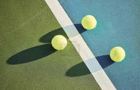 Photo for Ball, tennis court and turf for athlete or game for fitness or health as athlete or workout, match or serve. Sports, above and outdoor for energy or cardio in summer for exercise or tournament in sun. - Royalty Free Image