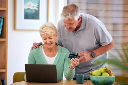 Photo for Online shopping, mature or happy couple with laptop, credit card or discount code for digital product at home. Coffee, ecommerce promo or senior people on fintech website for payment or sale search. - Royalty Free Image