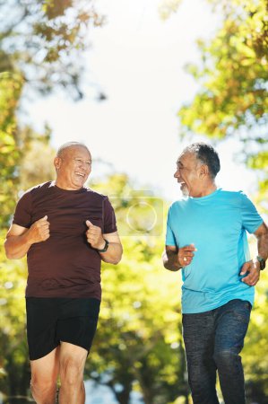Photo for Senior man, friends and running in nature for healthy exercise or outdoor training together at park. Happy mature people smile in body warm up, run or preparation for cardio workout or team fitness. - Royalty Free Image