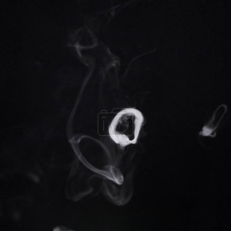 Photo for Smoke, steam or pollution with incense on dark background, fog or mist with vapor and mockup space in studio. Dry ice, pattern and texture with environment, gas and air with black backdrop and smog. - Royalty Free Image