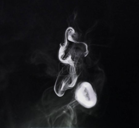 Photo for Smoke, dark background and mist, fog or gas on mockup space wallpaper. Cloud, smog and magic effect on black backdrop of steam with abstract texture, dry ice pattern or vapor of incense moving in air. - Royalty Free Image