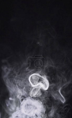 Photo for Smoke, black background and steam, fog or gas on mockup space wallpaper. Cloud, smog and magic effect on dark backdrop of mist with abstract texture, pollution pattern or incense vapor moving in air. - Royalty Free Image