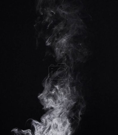 Photo for Smoke, dark background and incense, fog or gas on mockup space wallpaper. Cloud, smog and magic effect on black backdrop of steam with abstract texture, pollution pattern or mist vapor moving in air. - Royalty Free Image