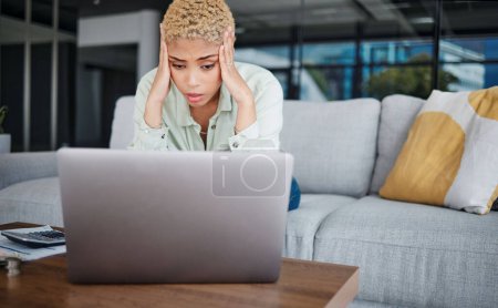 Photo for Businesswoman, stressed and laptop with work while remote with financial planning, savings or budget. African, person and frustrated with documents for debt management, retirement or funds for future. - Royalty Free Image