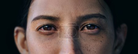 Photo for Person, crying and closeup for sadness mental health psychology tired stress, counseling or pain. Angry, eye tears and anxiety emotions or fear depression, dark or problem trauma for therapy. - Royalty Free Image