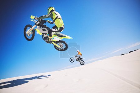Photo for Motorbike, people and sports with fitness, competition and training with safety, desert and workout. Athletes, sand and bikers with mockup, practice and cycling with exercise, challenge and energy. - Royalty Free Image