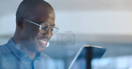 Photo for Reading, tablet and African businessman in the office planning legal project with deadline. Digital technology, glasses and professional male attorney working on a law case in workplace at night - Royalty Free Image