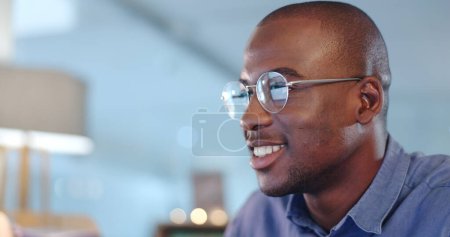 Photo for Reading, research and professional businessman in the office planning legal project with deadline. Focus, glasses and professional African male attorney working on a law case in workplace at night - Royalty Free Image