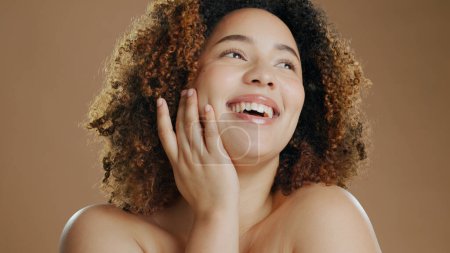 Photo for Happy woman, face and skincare in beauty, makeup or cosmetics against a studio background. Female person or model smile for dermatology, soft skin or facial spa treatment and grooming in happiness. - Royalty Free Image