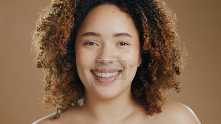 Photo for Portrait of happy woman, natural skincare dermatology or cosmetic wellness in studio with smile. Skin glow, model or confident biracial female person with beauty results or pride on brown background. - Royalty Free Image