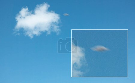 Photo for Ufo, spaceship in blue sky and alien on camera screen outdoor, surreal flying saucer and mockup space. Evidence of extraterrestrial spacecraft, drone in flight recording on camcorder or UAP in clouds. - Royalty Free Image