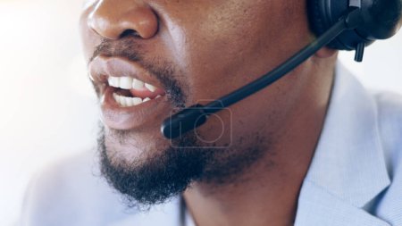 Photo for African man, closeup and call center for talking, microphone and voip tech for telemarketing, sales or contact us. Consultant, crm and customer service agent with headphones for advice at help desk. - Royalty Free Image