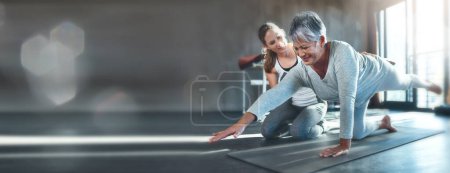 Photo for Exercise, mockup and mature woman in gym with personal trainer workout, help and stretching on banner. Info space, fitness and senior person with physio floor challenge, coaching motivation and bokeh. - Royalty Free Image