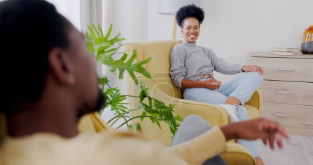 Photo for Relax, conversation and laugh with black couple, living room and communication, bonding together or break. Happiness, discussion or smiling at man, woman and family home on sofa, free time or leisure. - Royalty Free Image