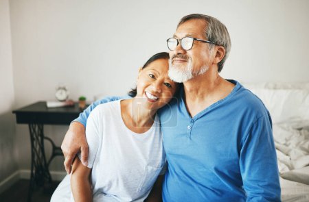Photo for Senior, portrait or happy couple hug in home bedroom together to relax on holiday with bond or support. Embrace, lovers or romantic Asian man with a mature woman with love, smile or care in marriage. - Royalty Free Image