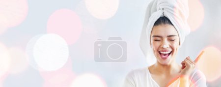 Photo for Woman, happy and beauty cream, skincare and funny morning routine on white background and bokeh overlay. Excited model with moisturizer, skin care and dermatology in studio and banner or mockup space. - Royalty Free Image