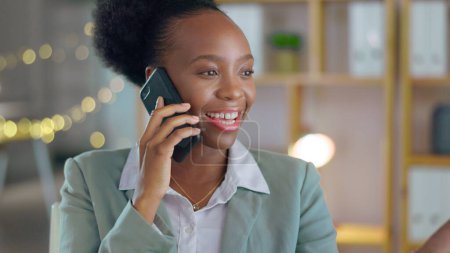 Photo for Business, black woman and phone call in office for talking, consulting and contact while working late. Happy employee, mobile networking and communication of feedback, conversation and cellphone chat. - Royalty Free Image