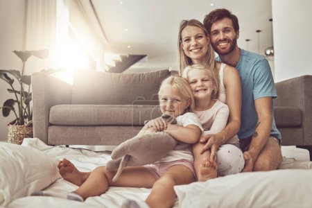 Photo for Happy family, portrait and hug on living room floor for weekend, holiday or relax together at home. Mother, father and children smile in happiness or love for embrace, fun bonding or support in house. - Royalty Free Image