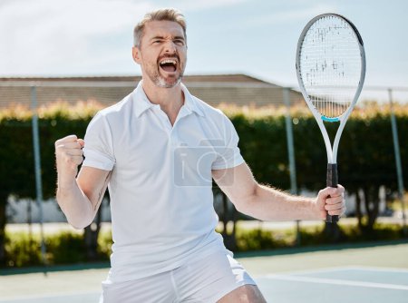 Photo for Winning, cheers and senior man with tennis win, celebration and happy with fitness and athlete on outdoor court. Fist pump, sports achievement and winner of competition or match, exercise and success. - Royalty Free Image