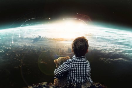 Photo for Boy, teddy bear and nuclear, war and apocalypse of violence, planet and explosion in space. Innocent child, looking and fear of strike on earth, brutal and invasion of danger, weapons and disaster. - Royalty Free Image