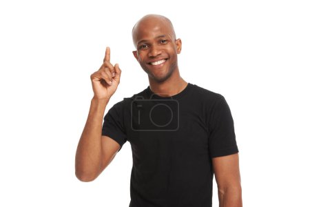 Photo for Man, smile and finger for idea with pointing up, studio and announcement for portrait on white background. African person, fashion aesthetic and advertising with happiness in mockup for casual look. - Royalty Free Image