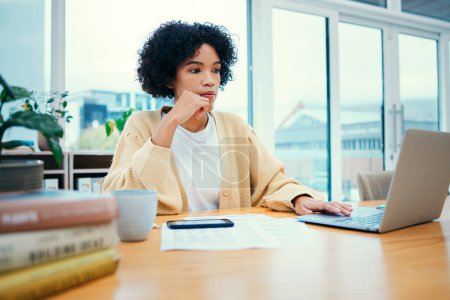 Photo for Woman with laptop, thinking and research in home office with documents, internet and freelance project. Remote work, ideas and girl with computer, paperwork and writing online article for website - Royalty Free Image