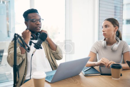Photo for Man, podcast team and streaming live or online recording, creative conversation or microphone. Black male person, woman or laptop office for social network, influencer audience or content creating. - Royalty Free Image