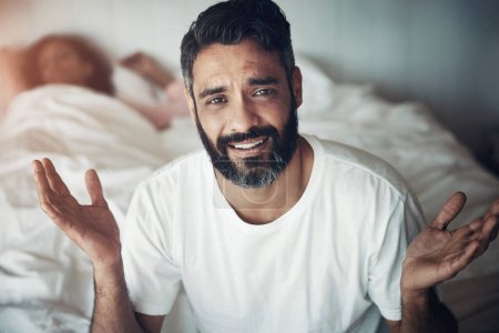 Photo for Confused, portrait of a man with stress in the bedroom, home and marriage anxiety with wife. House, frustrated and face of a person with a gesture for mental health, fear or sad about a divorce. - Royalty Free Image