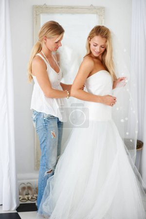 Photo for Wedding, dress and bride with girl friend in a luxury boutique, shop or store in a mall. Retail, romance and female person from Canada preparing for marriage ceremony, party or reception for love - Royalty Free Image